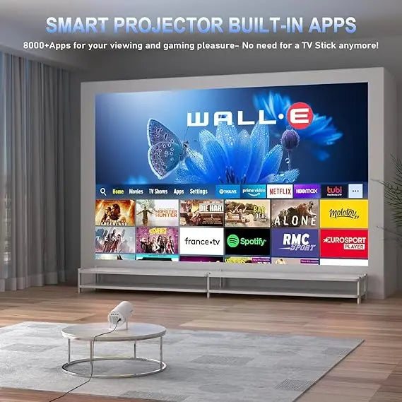 Smart projector displaying a variety of apps with 'WALL-E' on the screen, in a room setting.